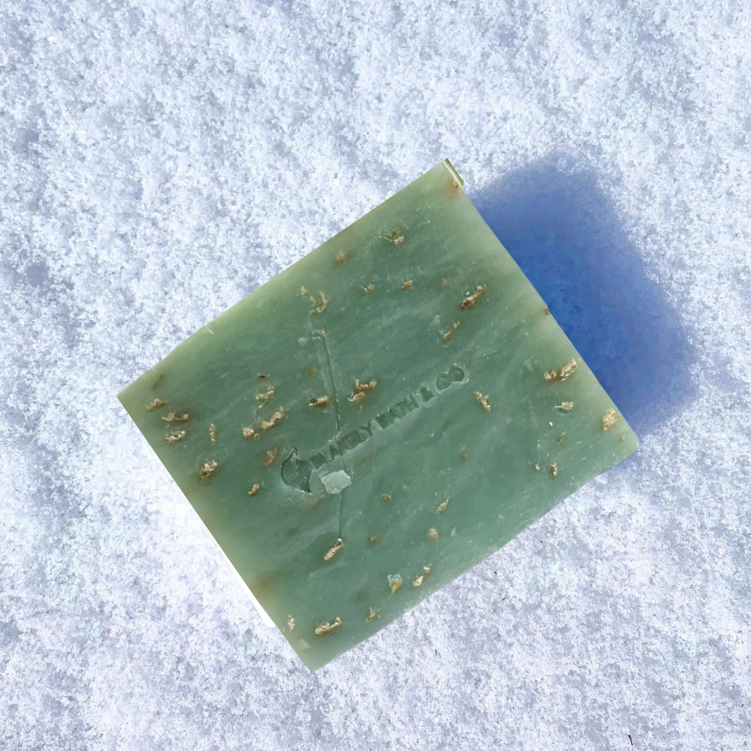 Winter Magic Face and Body Soap Bar by Blakely Bath & Co, infused with peppermint, lavender, rosemary, and soothing oatmeal to cleanse, hydrate, and refresh skin with a calming, winter-inspired scent