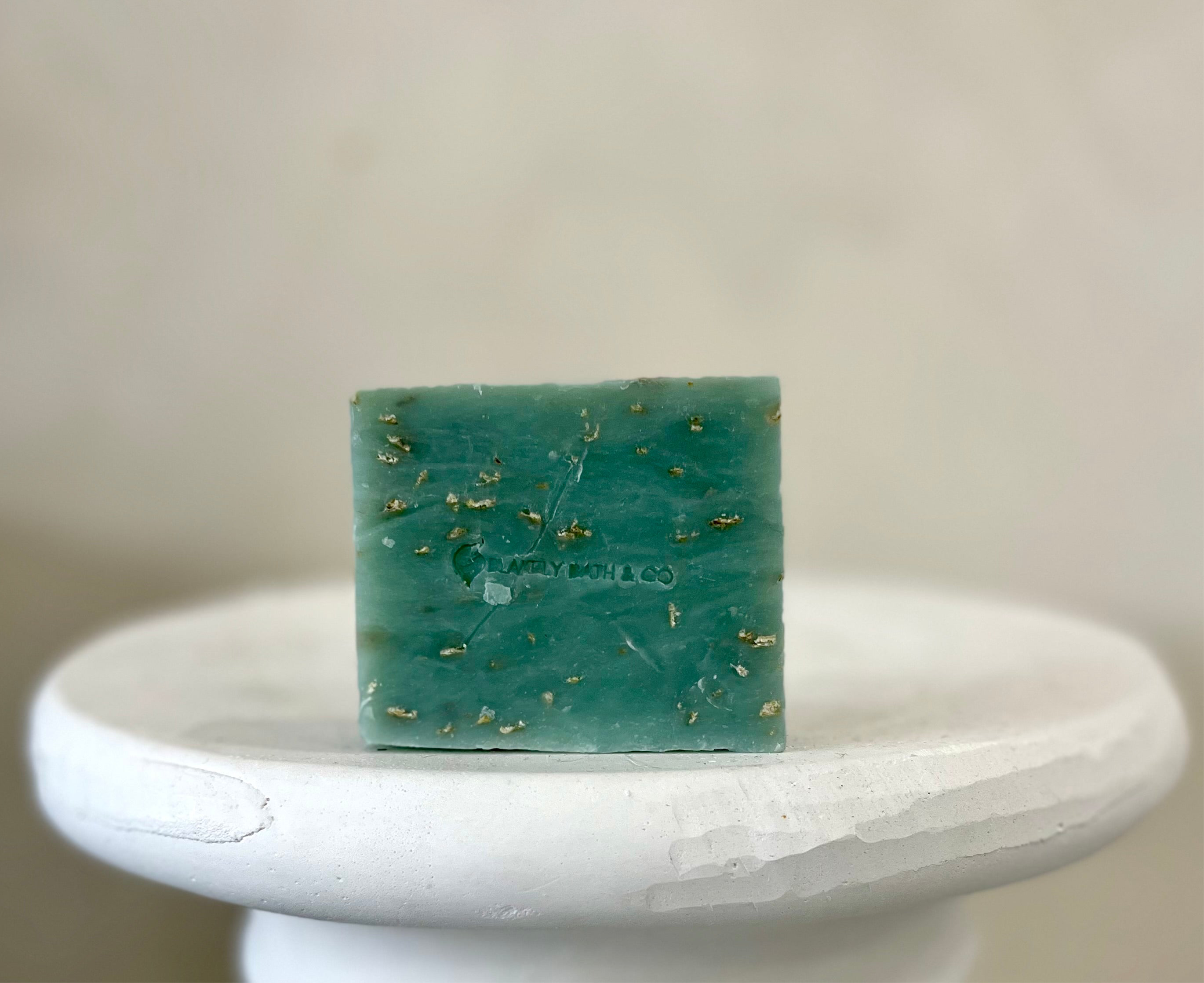 Winter Magic Face and Body Soap Bar by Blakely Bath & Co, infused with peppermint, lavender, rosemary, and soothing oatmeal to cleanse, hydrate, and refresh skin with a calming, winter-inspired scent