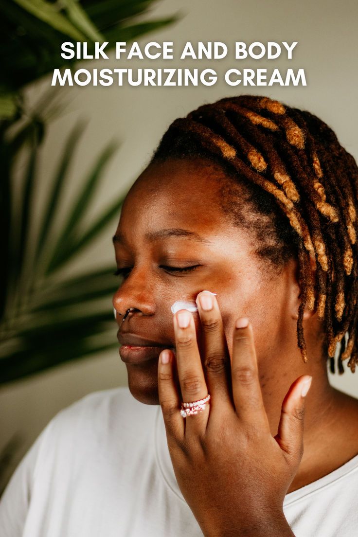 Shana Black applying Silk Dream Moisturizing Cream by Blakely Bath & Co to her face, enjoying the rich hydration and soothing benefits for smooth, nourished skin