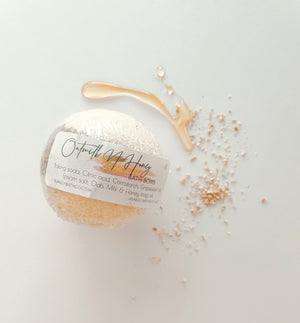 Blakely Bath & Co Oat Milk N Honey Bath Bomb, a nourishing, fizzing bath bomb with the calming scents of oat milk and honey, designed to hydrate and soothe your skin for a luxurious, relaxing bath experience