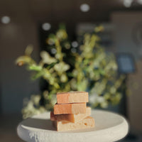 Stack of Cherry Almond soap bars for nourishing and moisturizing skin, infused with sweet cherry and almond oils for a soothing, aromatic cleanse by Blakely Bath & Co