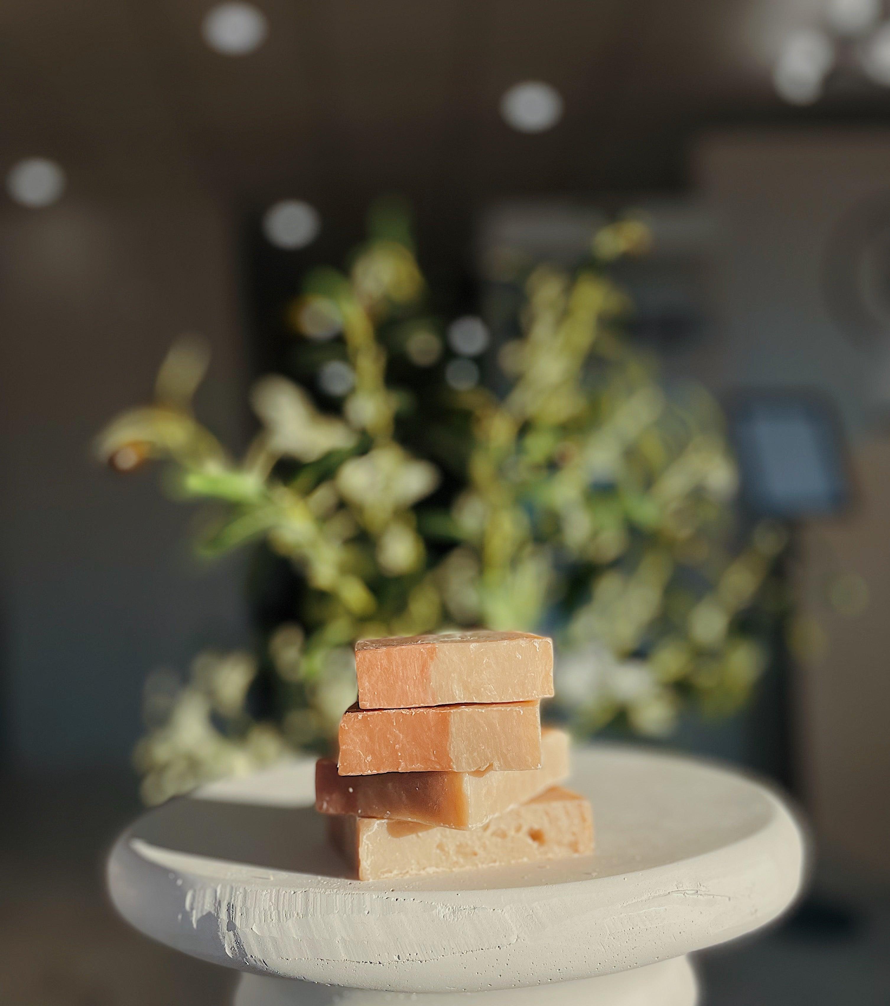 Stack of Cherry Almond soap bars for nourishing and moisturizing skin, infused with sweet cherry and almond oils for a soothing, aromatic cleanse by Blakely Bath & Co