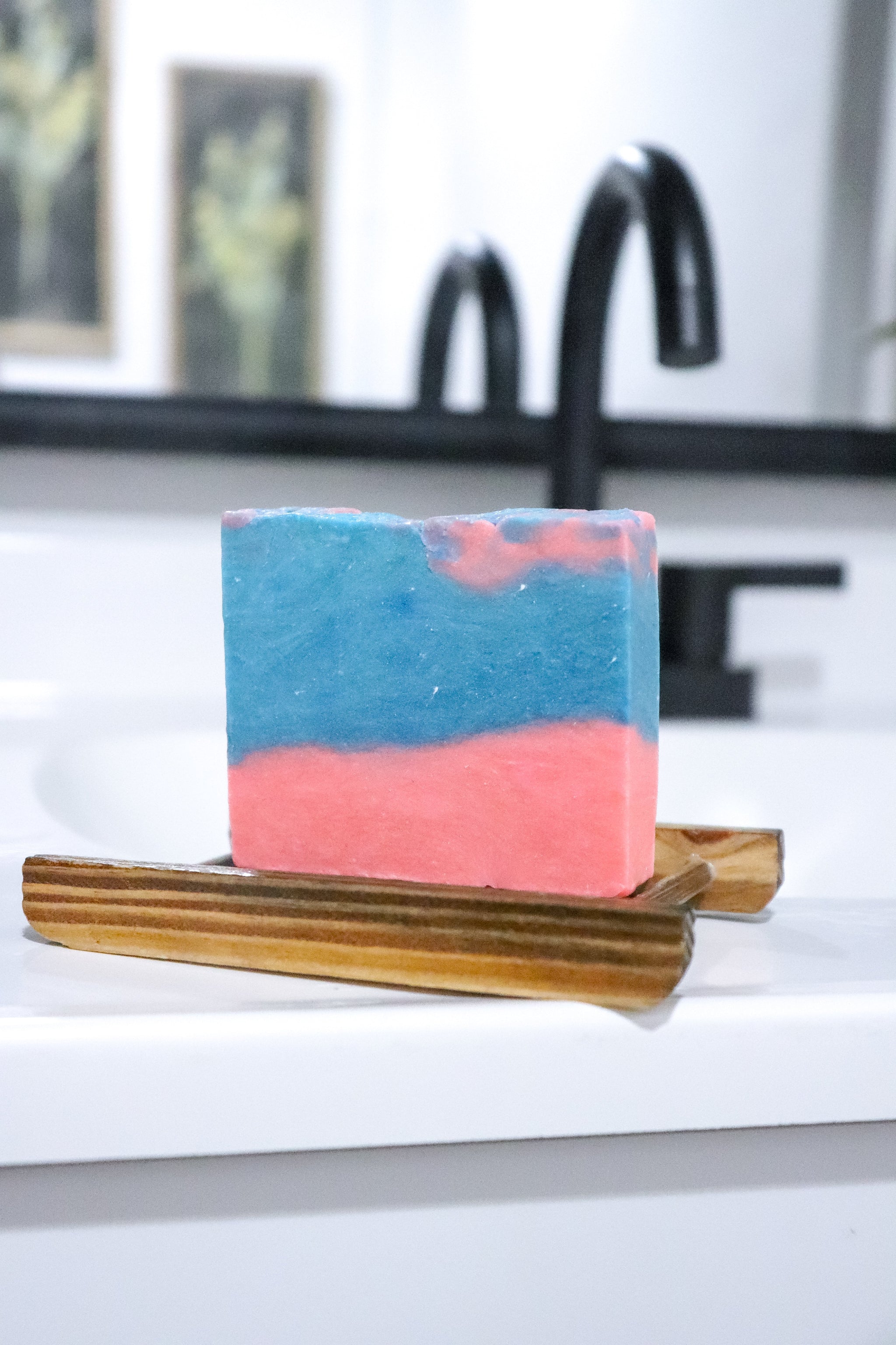 Colorful Sweet Like Candy soap bar on a wooden soap dish by Blakely Bath & Co