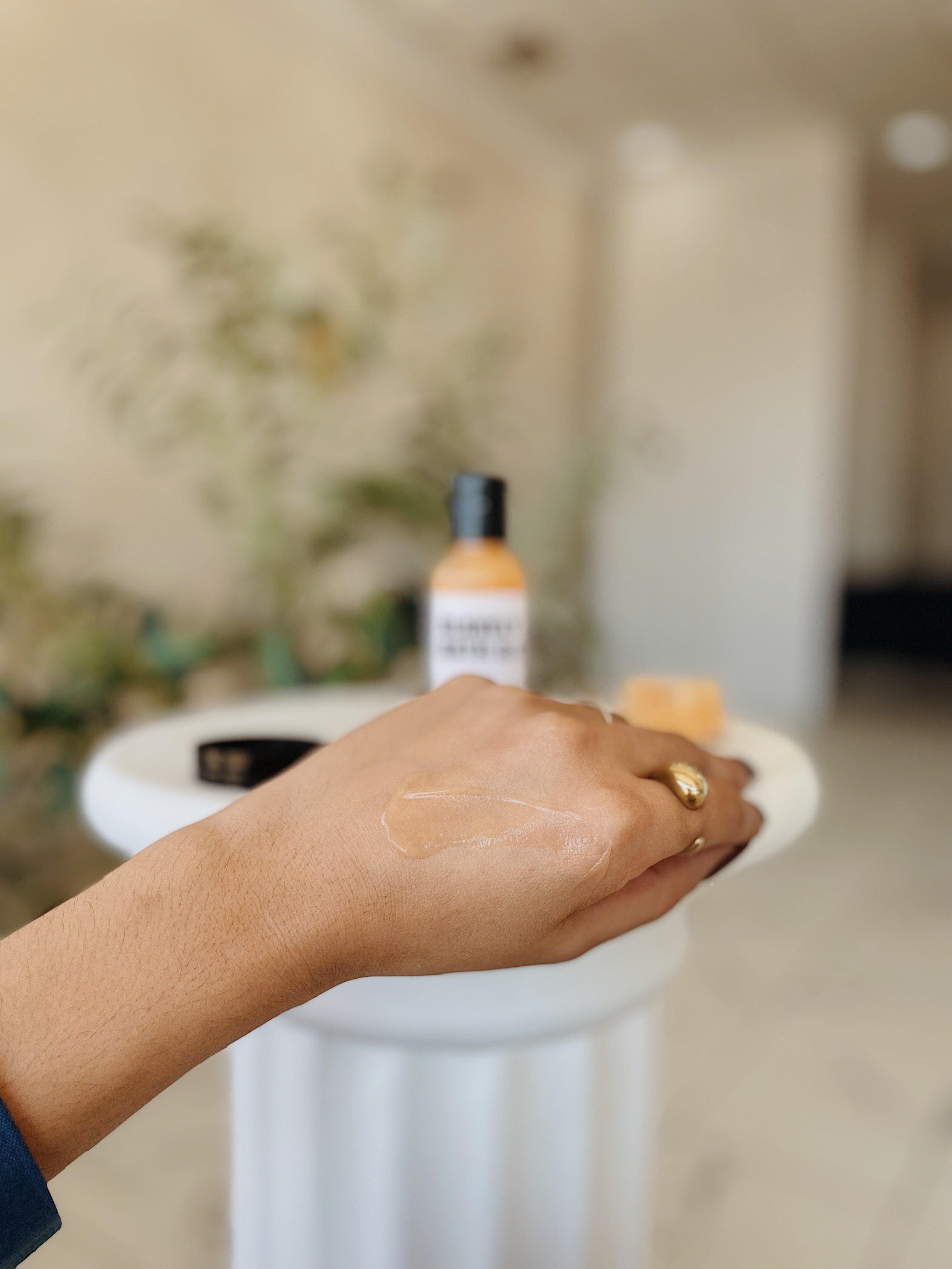 Applying Blakely Bath & Co Pain Relief Gel to the hand, providing fast-absorbing, cooling relief for joint pain, muscle aches, and soreness with a soothing, targeted application