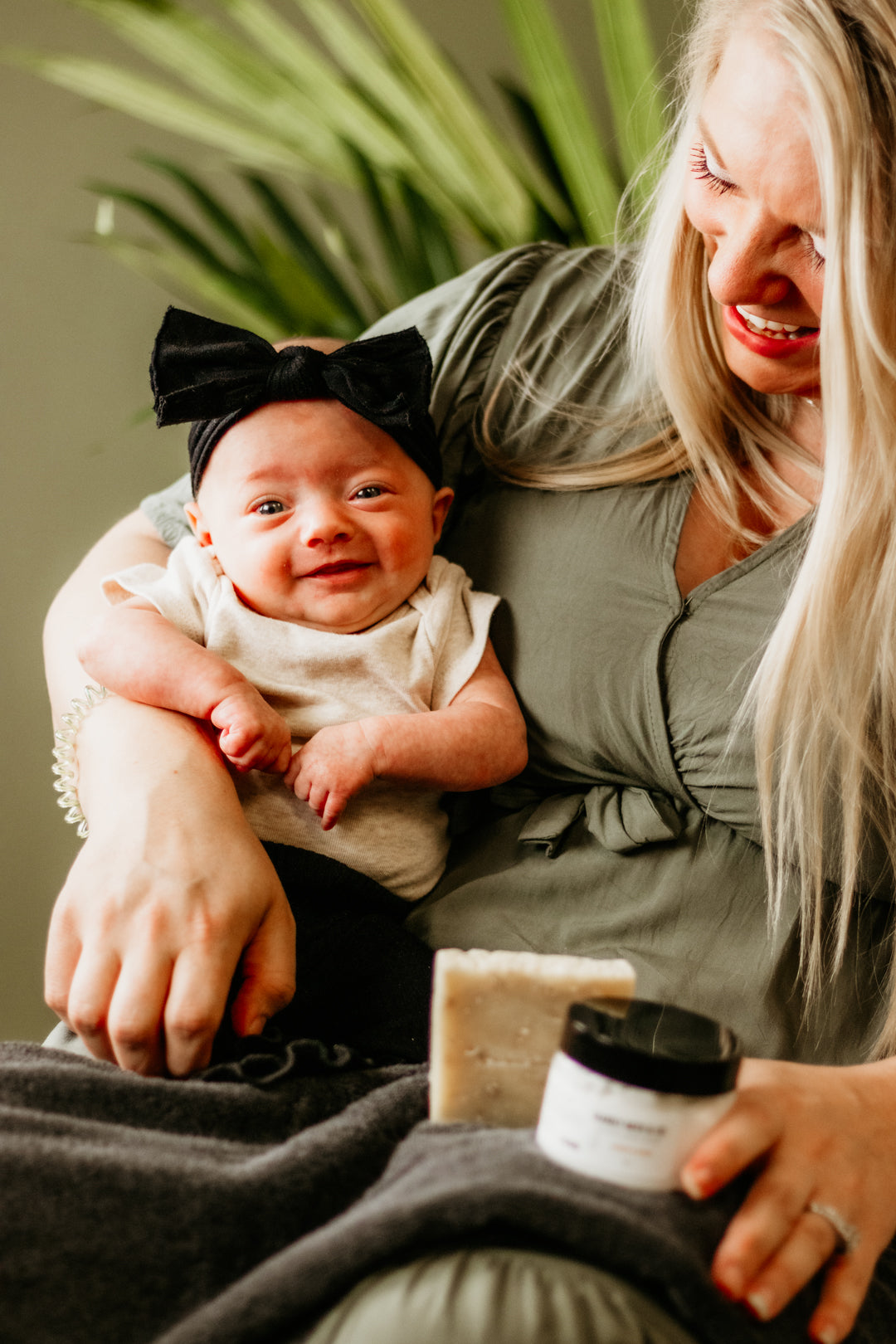Happy baby and mom enjoying the results of the Blakely Bath & Co Dry Skin & Eczema Relief Kit, feeling good and looking good with soft, soothed, and healthy skin