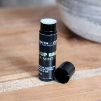 Blakely Bath & Co Vanilla Mint Lip Balm, a refreshing blend of natural ingredients to hydrate and soothe dry lips, leaving them soft, smooth, with a subtle minty-vanilla scent