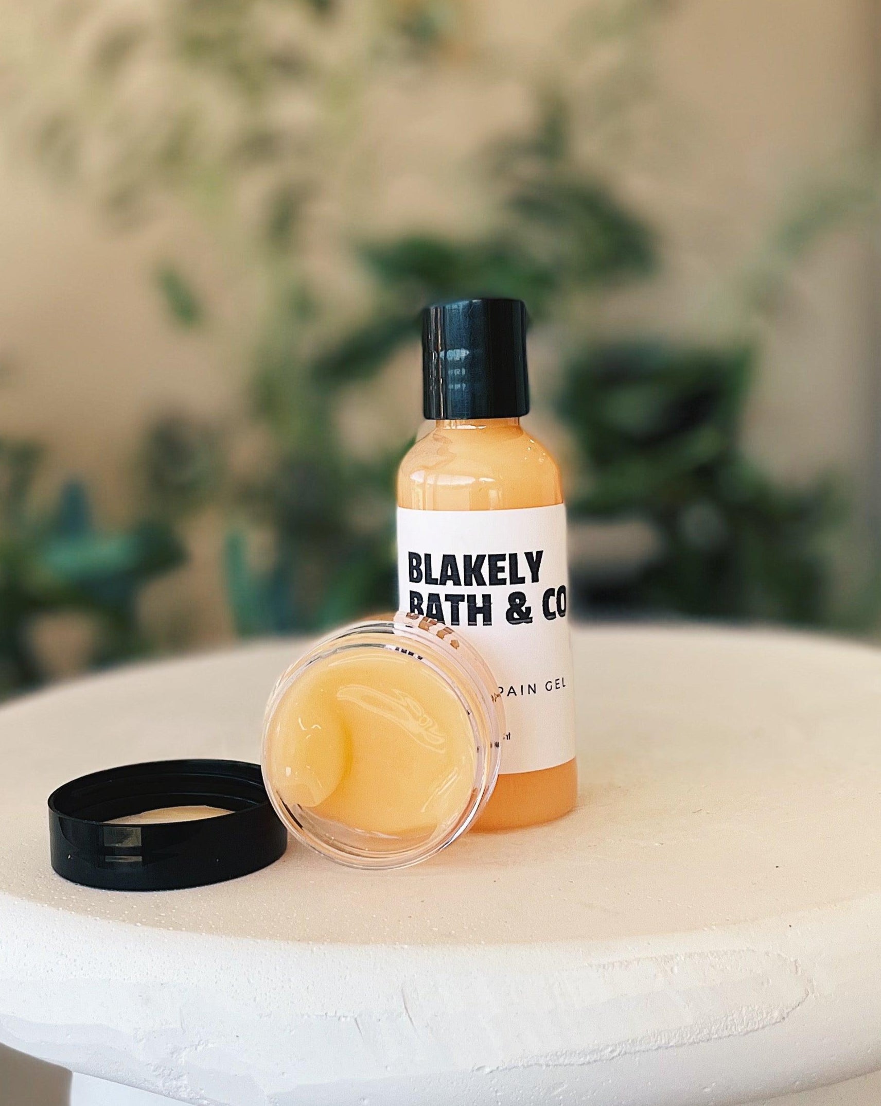 Blakely Bath & Co Pain Relief Gel in both travel size and regular size, offering fast-absorbing, cooling relief for muscle aches, joint pain, and soreness, perfect for on-the-go or home use