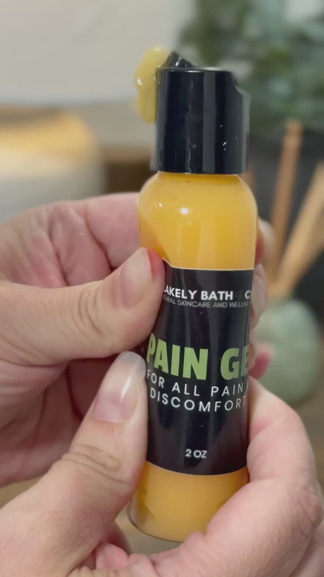 Hands squeezing pain gel for all pain and discomfort by Blakely Bath and Co 