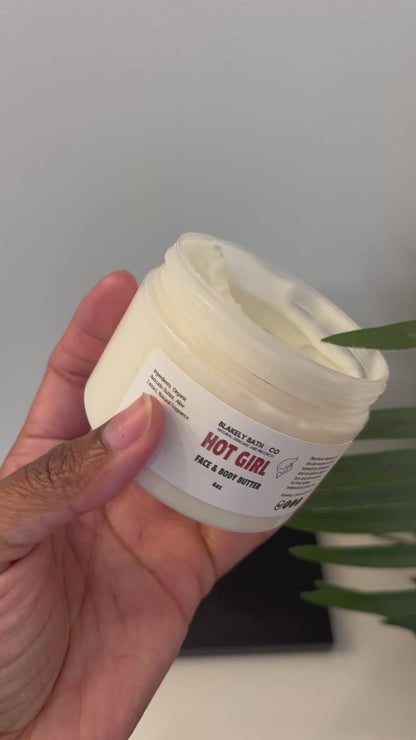 Video showing a finger dipping into Hot Girl Face and Body Butter by Blakely Bath & Co, highlighting its rich, creamy texture as it melts into the skin for deep hydration and a smooth, glowing finish