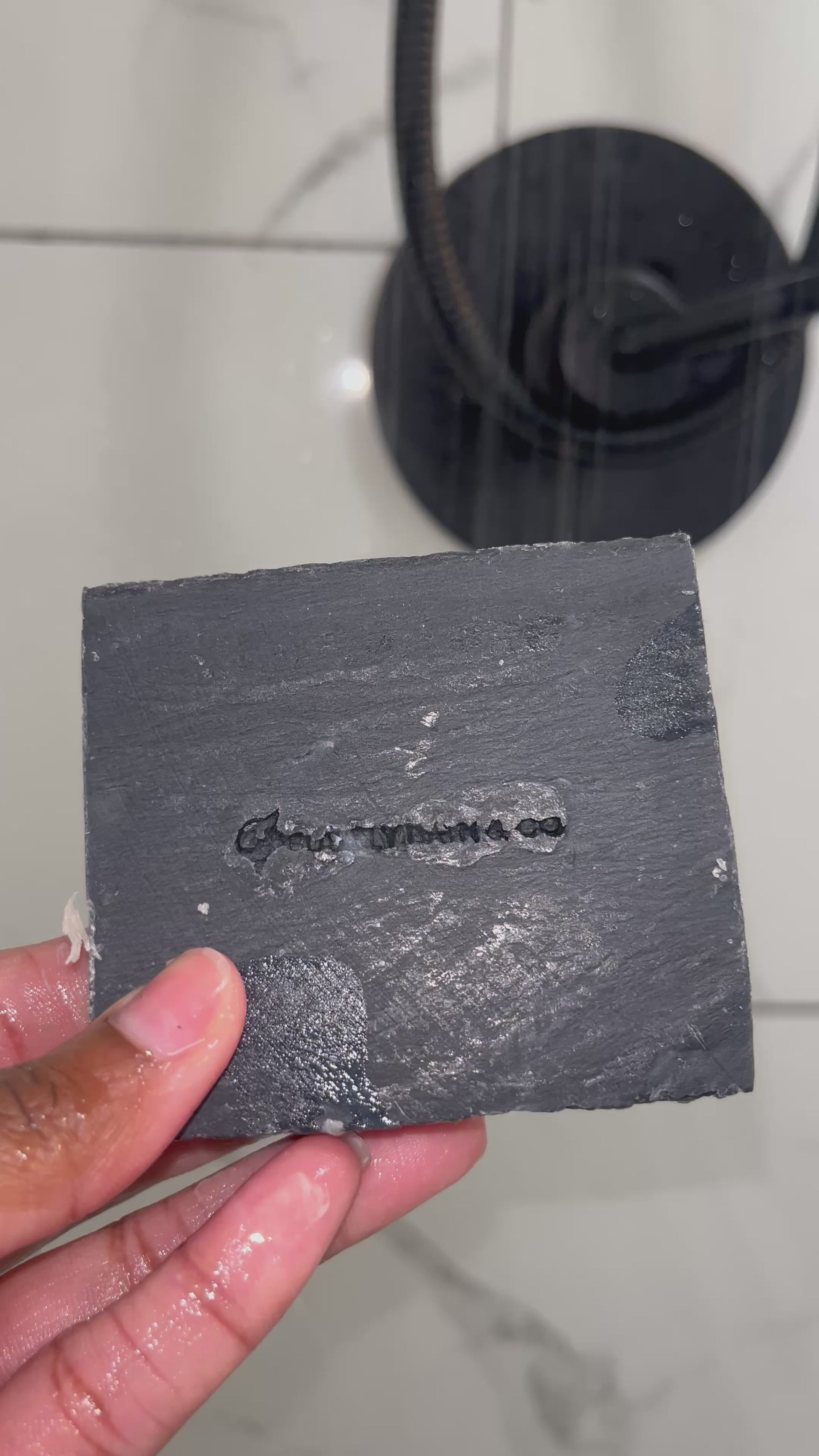 Use Lavender Charcoal Soap in shower by Blakely Bath & Co for detoxifying and soothing oily skin and acne, infused with calming lavender and activated charcoal to purify and cleanse deeply