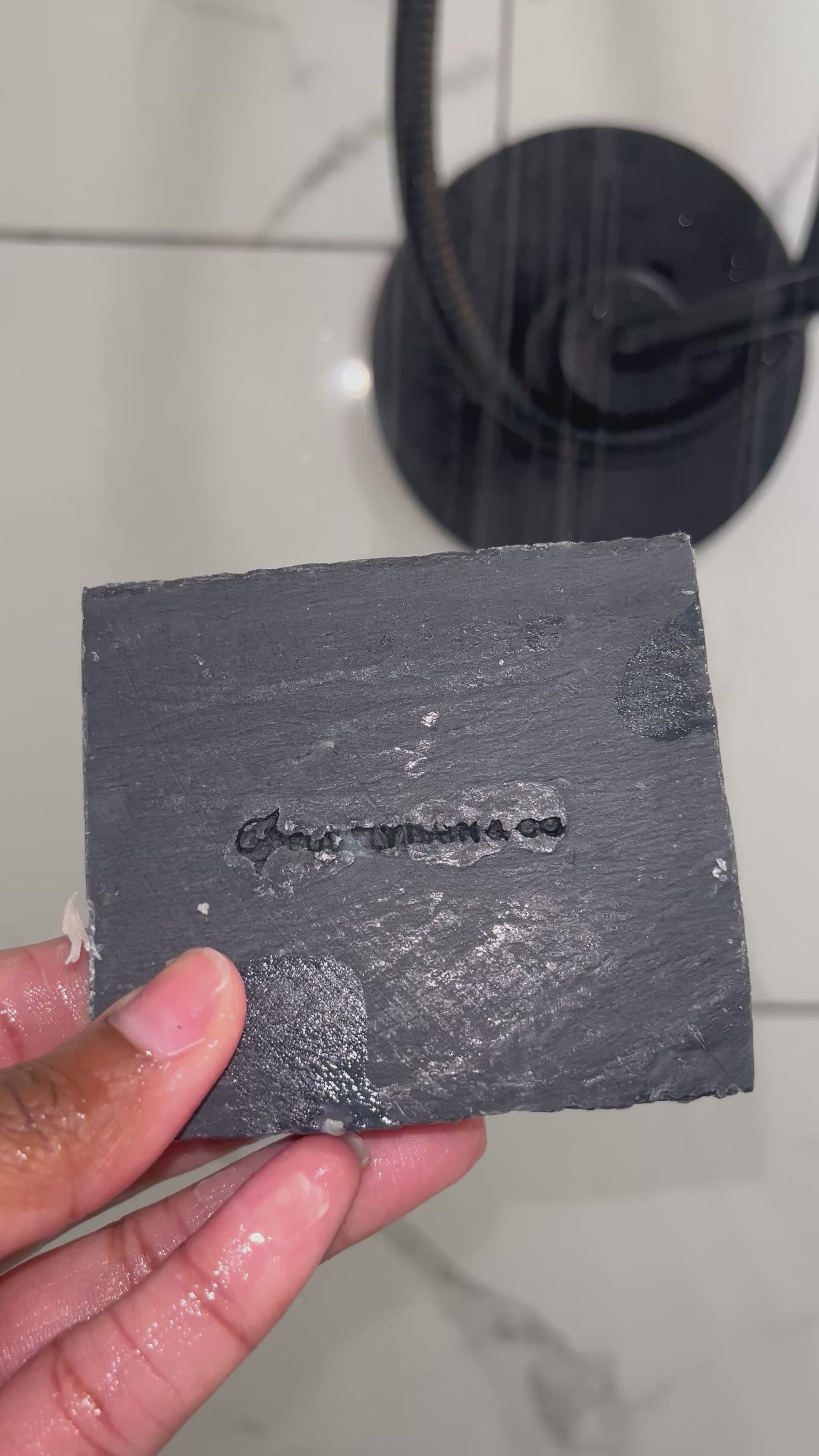 Use Lavender Charcoal Soap in shower by Blakely Bath & Co for detoxifying and soothing oily skin and acne, infused with calming lavender and activated charcoal to purify and cleanse deeply