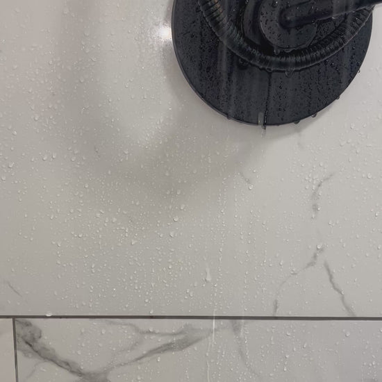 Sade Campbell, owner of Blakely Bath & Co, showcasing Feminine Foam Wash in the shower, demonstrating the gentle, pH-balanced formula as it creates a luxurious foam for a refreshing, natural cleanse