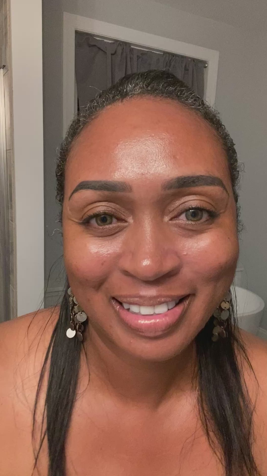 Black woman sharing her testimonial on goat milk soap – a natural skincare review highlighting improved hydration and best skincare she loves naturally.