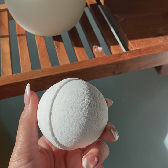 Video showing Blakely Bath & Co Detox Bath Bomb fizzing in the tub, demonstrating how to use for a relaxing, spa-like experience with soothing bubbles and a calming scent to enhance your bath time
