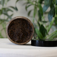 Blakely Bath & Co Coffee Anti-Aging Scrub with the top off, showcasing the rich, exfoliating scrub made with coffee grounds to help rejuvenate and firm skin while reducing fine lines and wrinkles"