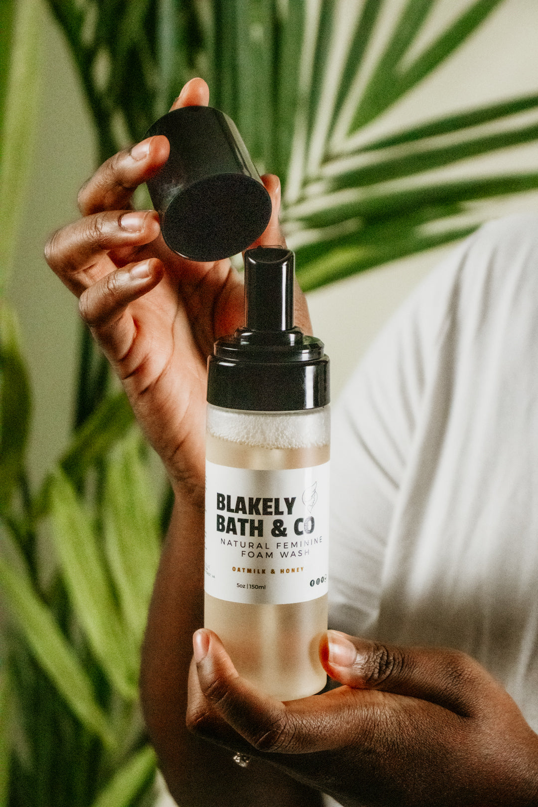 Top view of Blakely Bath & Co Feminine Foam Wash with the cap off, revealing the foaming formula inside, designed for a gentle and refreshing pH-balanced cleanse